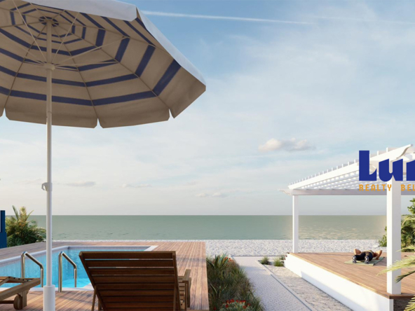 Turquoise Seas - pool and beach area at Secret Beach Condo