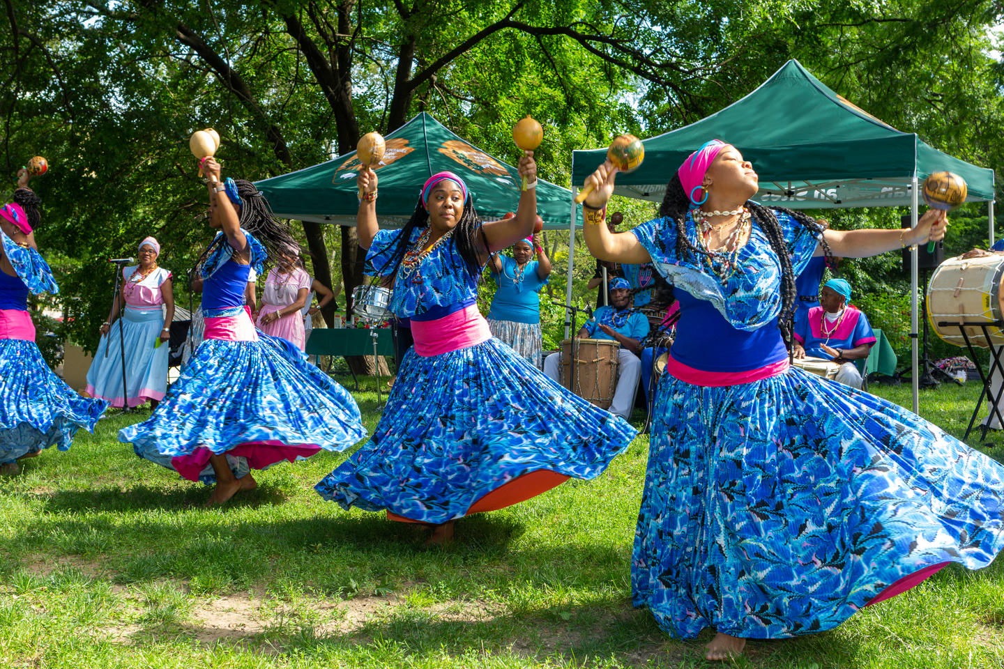 Garifuna dancers in traditional attire. The Garifuna language in Belize is a UNESCO Intangible Cultural Heritage and an endangered language.