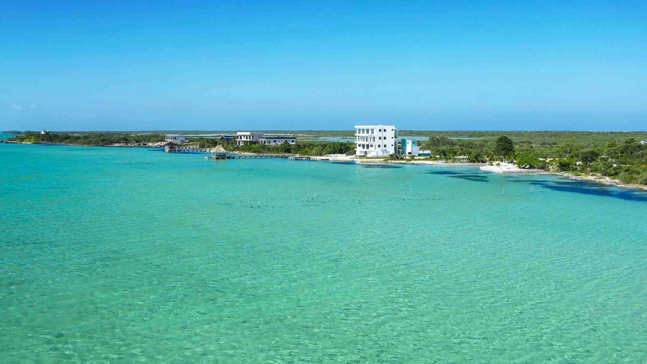 West Ambergris Caye has been rapidly growing over the past five years. The mid-rise pictured is Turquoise Seas Residences, cupped by the blue skies and turquoise blue waters; complimented by its proximity to Secret Beach. Click here to learn more about Turquoise Seas. 