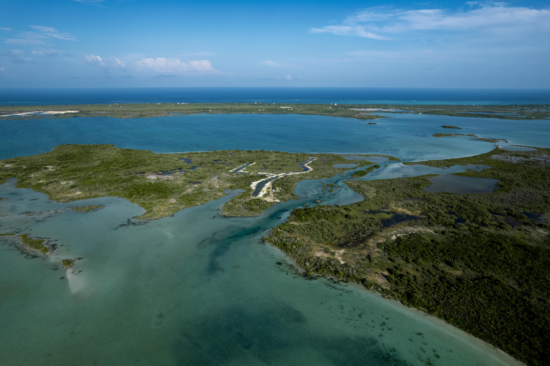 Canal-Front Silver Palm Island Lot › Phase 1: $125,000 | Private Boat Slip | 70% Financing